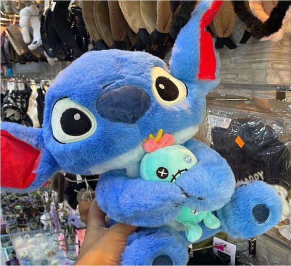 titch avec cette peluche officielle Disney